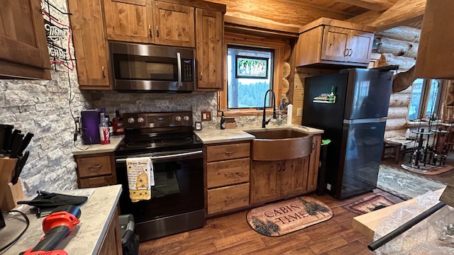 Schaaf kitchen with stone surround and farmhouse sink