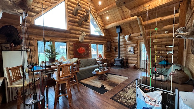 Great room and loft overlook with tall lake-facing windows
