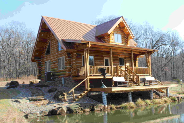 The Schaaf above the water with its wraparound porch