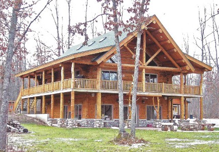The Higgins with two levels of covered porch