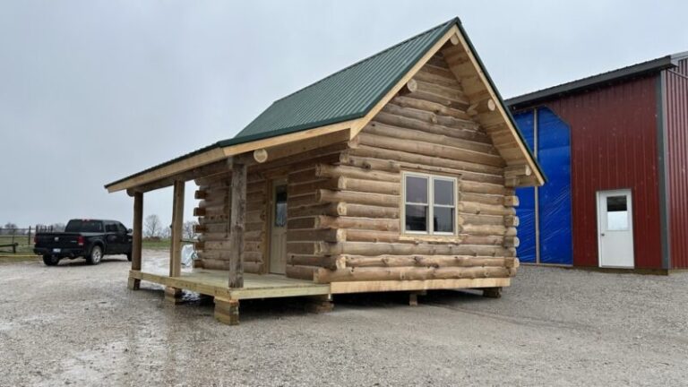 A log cabin shell completed at the shop before delivery