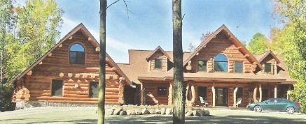 The Superior lodge with its stone entry and multiple dormers