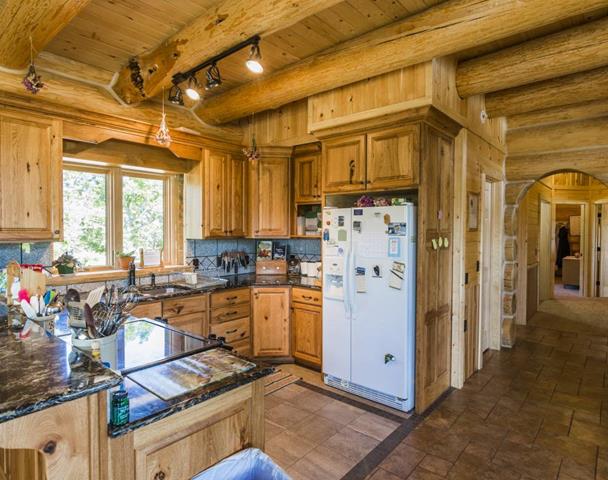 Kitchen with log posts and generous counter space