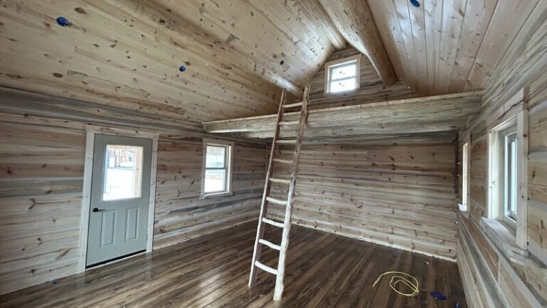 Interior of the Homer with its loft ladder and pine walls